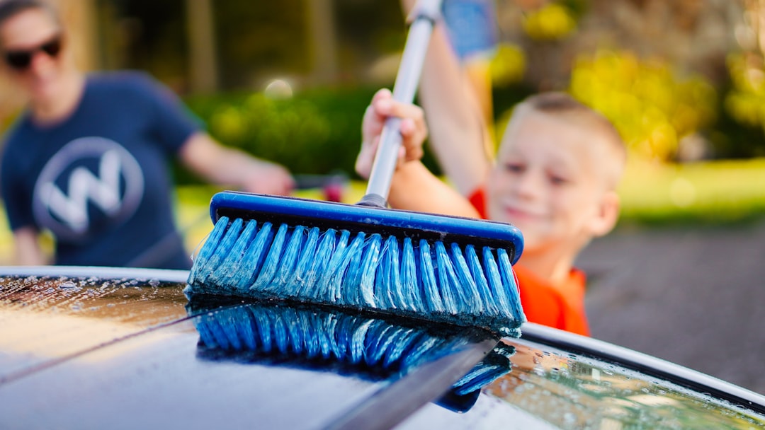 Kid washing car